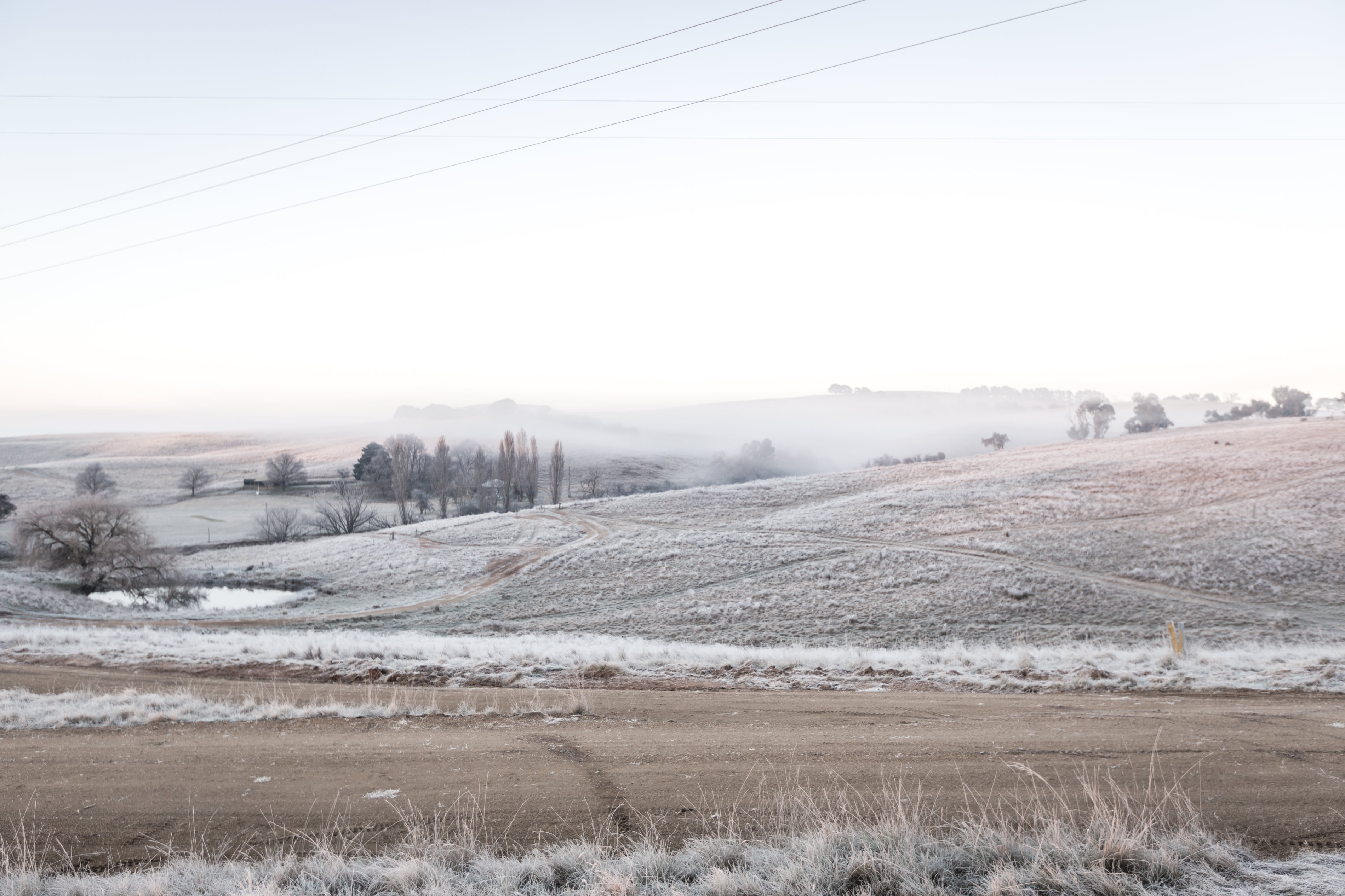 Early morning frost overlooking the sheep station at crookwell